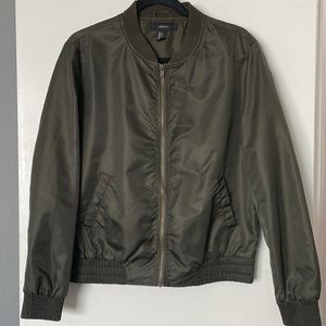 Army green bomber jacket in size large.
